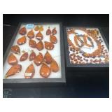 2 glass top tray displays w/ faux amber