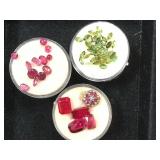 3- ramekins of gemstones, 2- rubies, 1- green