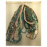 Several gemstone necklaces including turquoise,
