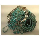 Several gemstone necklaces including turquoise,