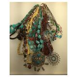 Several gemstone necklaces including turquoise,