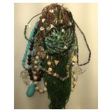 Several gemstone necklaces including turquoise,