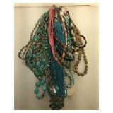 Several gemstone necklaces including turquoise,