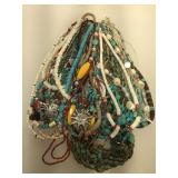 Several gemstone necklaces including turquoise,
