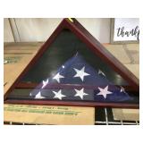 Folded American Flag in Triangular shadow box