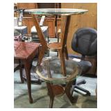 2- round wood based glass top end tables