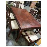 6 seat wooden table w/ padded chairs  & claw feet