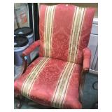 Upholstered claw foot arm chair