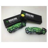 2 NIB Biohazrd Zombie survival knives.