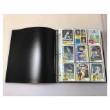 Binder of 1984 Topps Baseball Cards