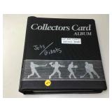 Binder of sports cards.