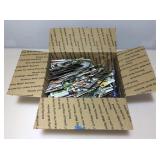 Box of assorted sports cards.