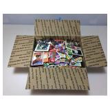 Box of assorted sports cards.
