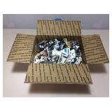 Box of assorted sports cards.