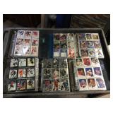 Mixed lot of sports cards in albums