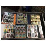 Huge lot of sports cards in albums with many