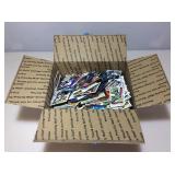 Box of assorted sports cards.