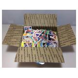 Box of assorted sports cards.