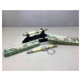 2 NIB knives with display stand