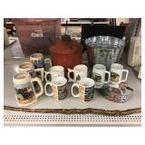 Metal can and bucket, collectible mugs and more. Metal can and bucket, collectible mugs and more.