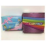 2 pair roller skates in box. 2 pair roller skates in box.