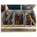 Assortment of tools in containers. Assortment of tools in containers.