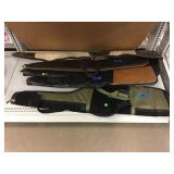 5 gun/rifle cases.