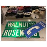 Street signs and green telephone sign. Street signs and green telephone sign.