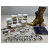 Cast Metal boot figure with assorted craft items. Cast Metal boot figure with assorted craft items.