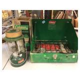 Coleman lantern and 2 burner camping stove. Coleman lantern and 2 burner camping stove.
