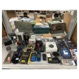 Assorted electronics. Nest, BAC alcohol testers,