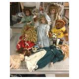 Assorted collectible dolls and more.