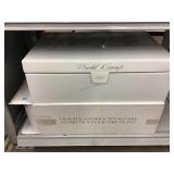Wedding dress and veil in unsealed keepsake box.