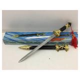 NIB mini sword knife with tassel.