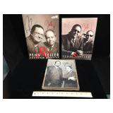 Signed Penn and Teller programs and framed signed