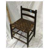 Antique short child size chair , splint seat,