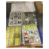 4 albums of sports cards