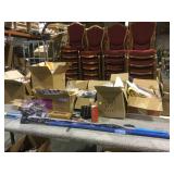 Table top of miscellaneous. Linens, lum r grips &