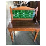Solid oak washstand with Art Nouveau tile back