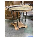 Wood oval side table with brass top, brass legs,
