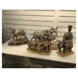 5pc lot including 4 resin elephant figurines and