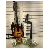 Video game lot Including Xbox 360 guitar hero