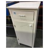 Painted white wooden storage cabinet with drawer