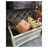 Outdoor patio storage bin with assorted baskets