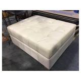 Large cream colored sleeper ottoman