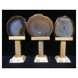 3 Brazilian agate geodes, approx 6 inches on wood