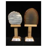 2 Brazilian agate geodes, approx 6 inches on wood