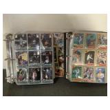 2 sports cards in albums