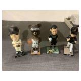 4 bobble heads