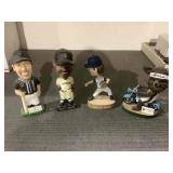 4 bobble heads